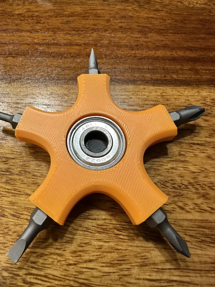 Fidget spinner bit holder McLaren style - Free 3D Print Model - MakerWorld