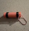 Keyring hole enlargement