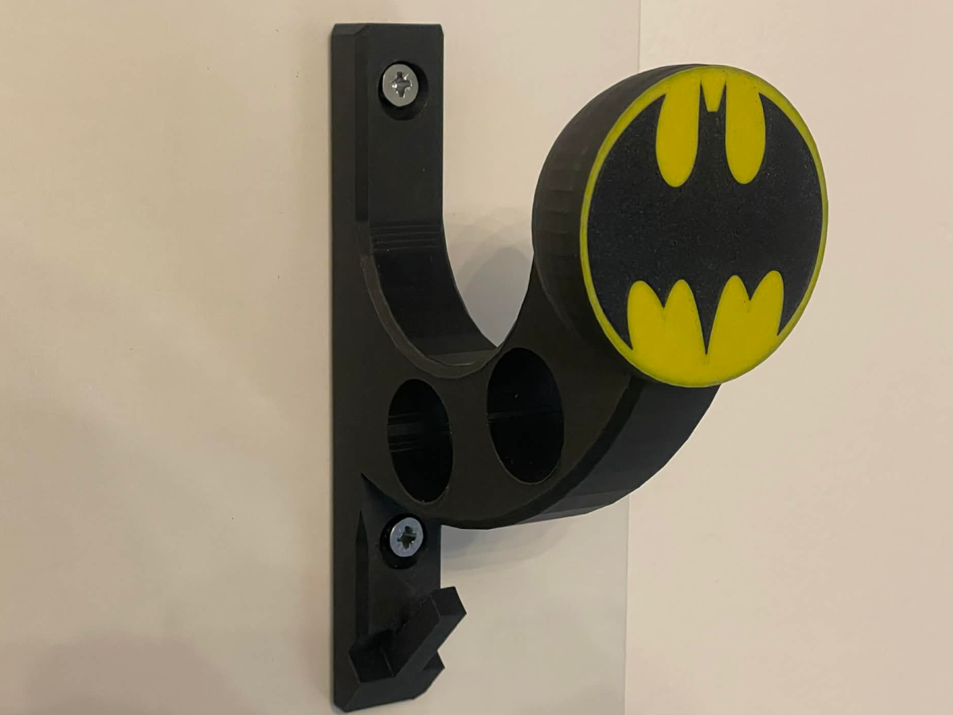 Batman porta casco, chiavi, giacca