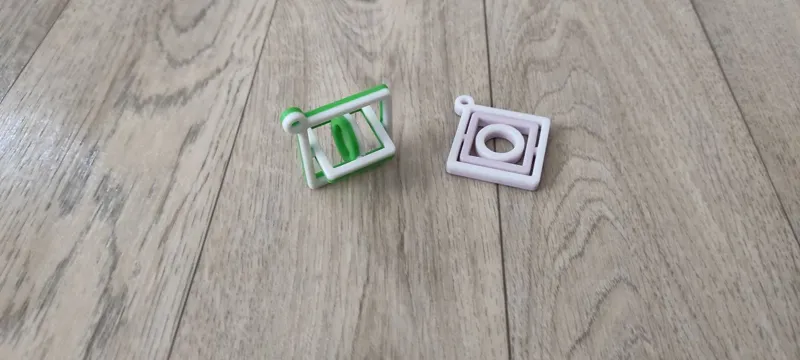 Square rotation keychain