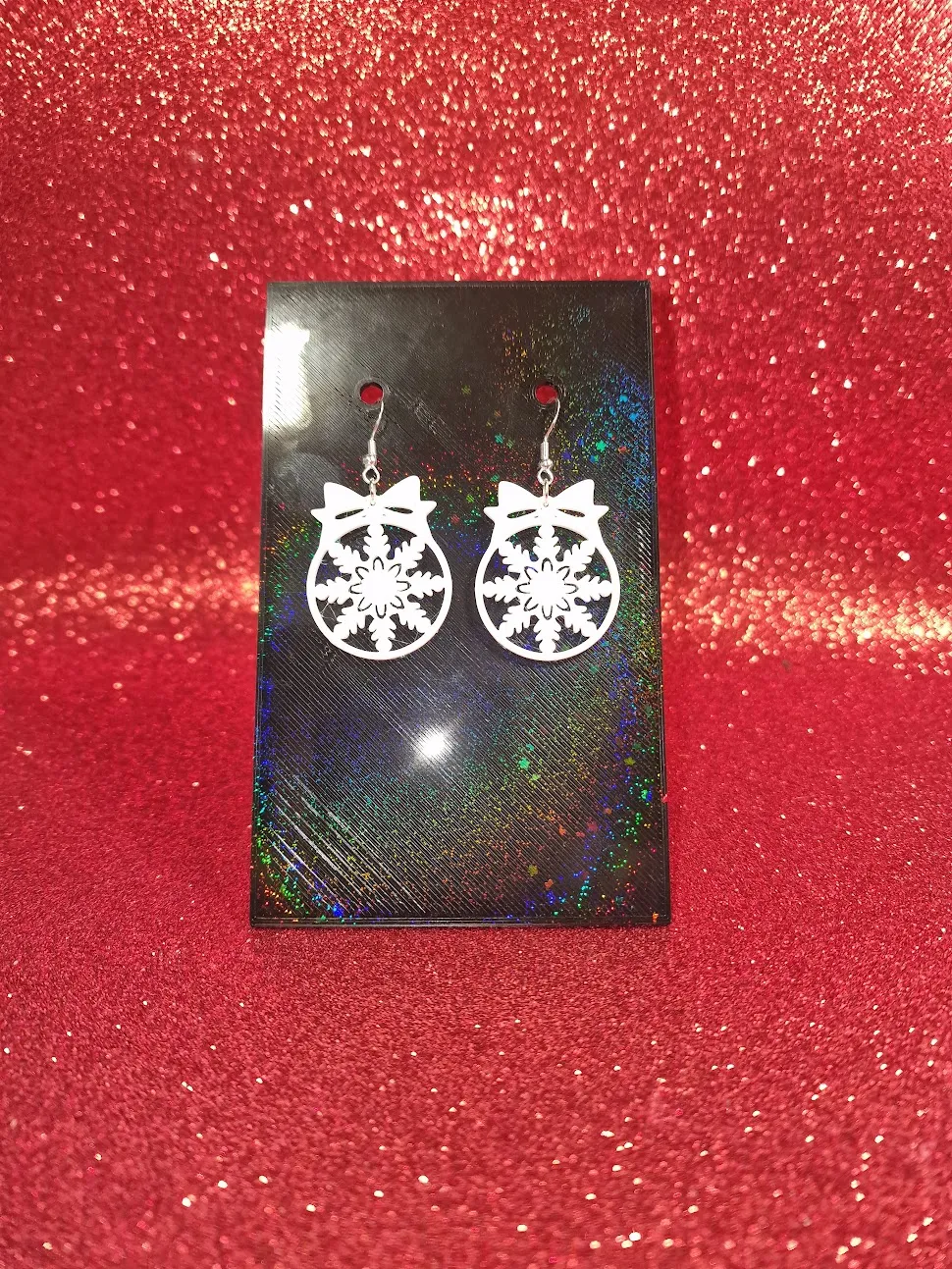 Snowflake in a ball earrings view 2