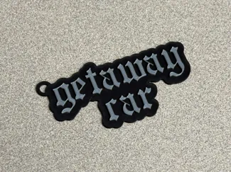 Taylor Swift - Getaway Car Keychain