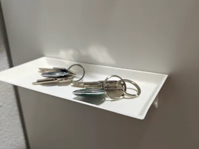 Wall mounted key tray