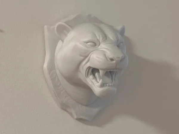 Buste mural de tête de jaguar