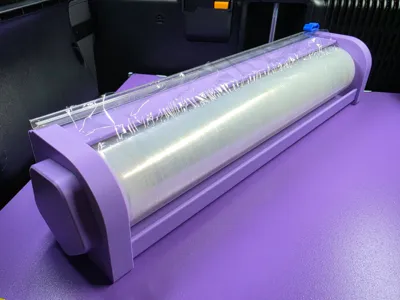 Plastic wrap dispenser