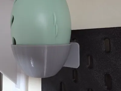 Skadis mount for lint roller