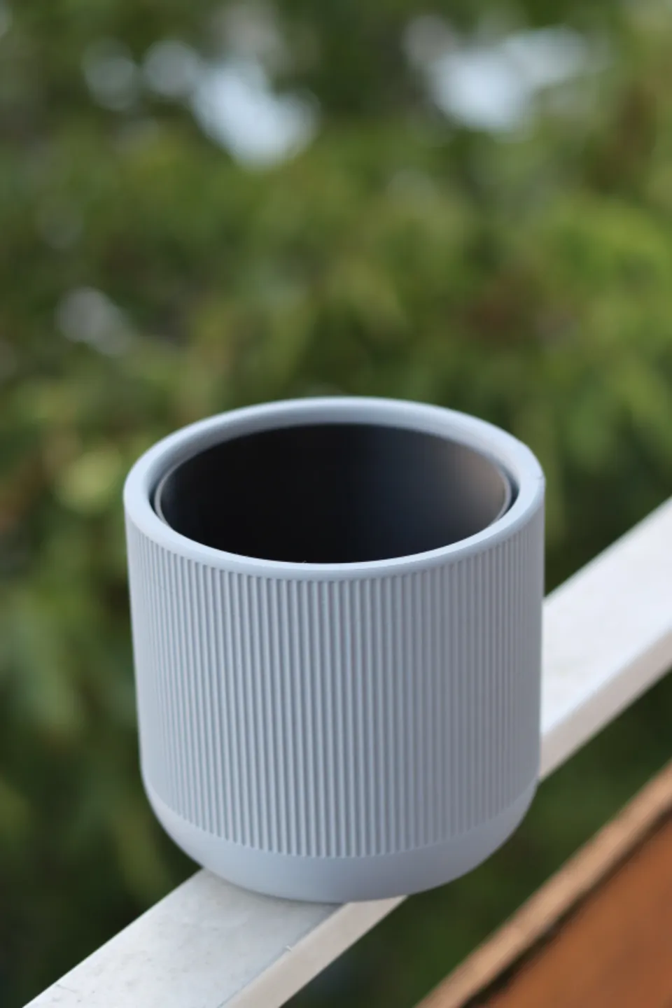 Self-watering plant pot with a narrow design view 3