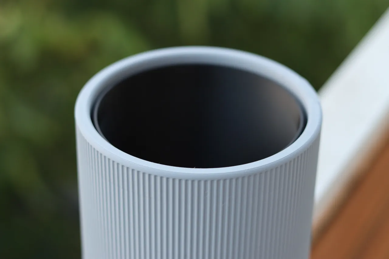 Self-watering plant pot with a narrow design view 2