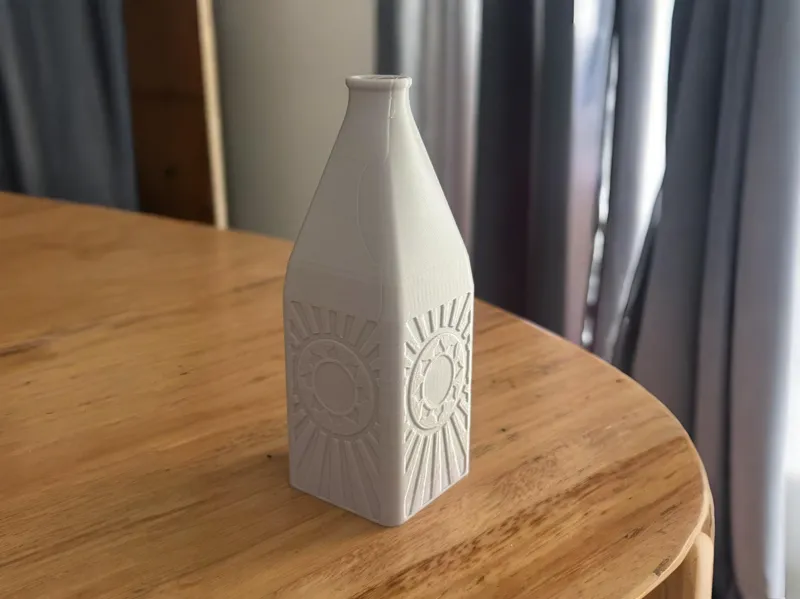 Sun motif bottle for water plants