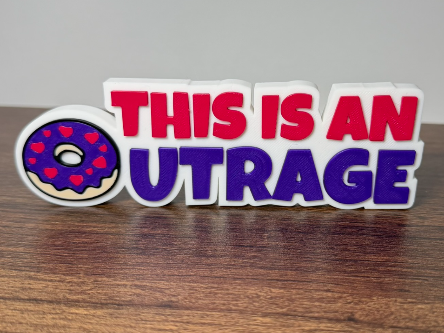 This Is An Outrage Donut Desk Sign