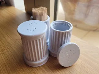 Salt and pepper shakers roman/greek style