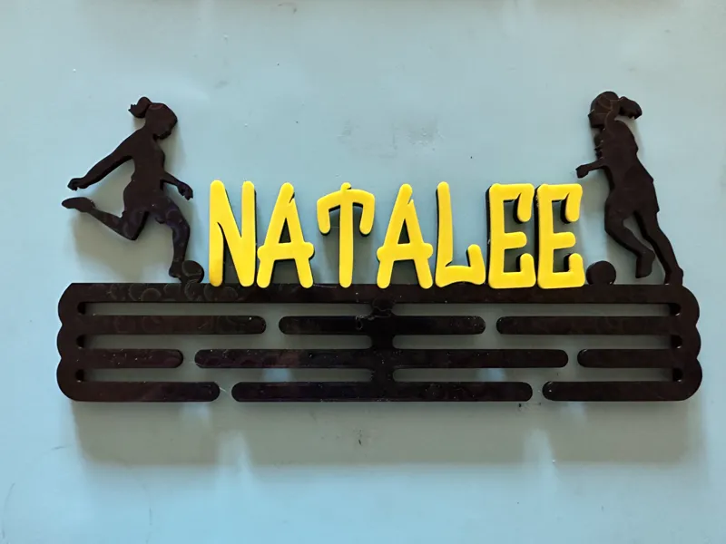 Natalee medal support football