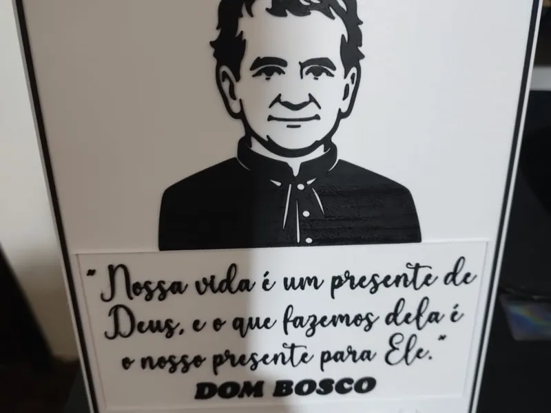 Quadro com frase e imagem de São João Bosco