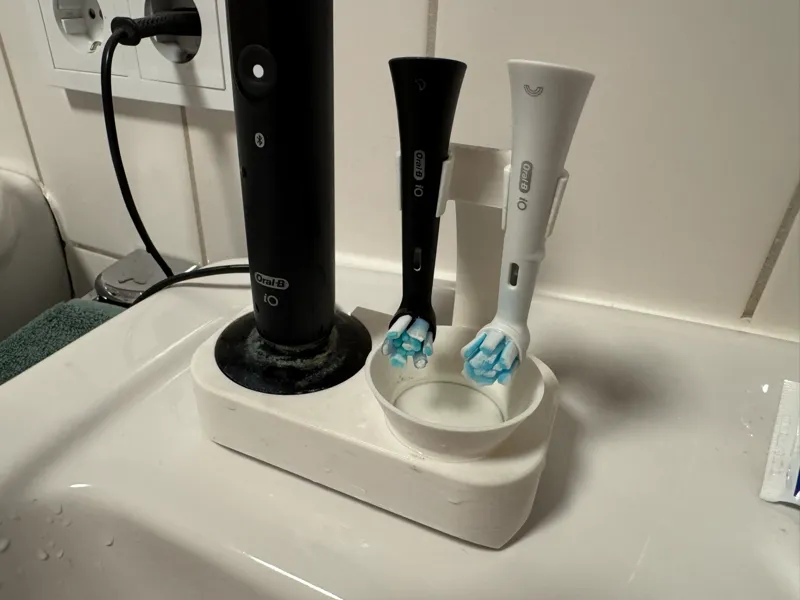 Oral B io9 holder w/ heads and removable dripbowl