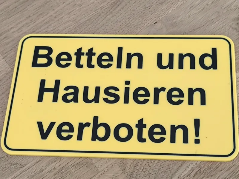 Schild - Betteln und Hausieren