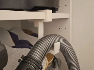 Ikea shelf vacuum hose hook