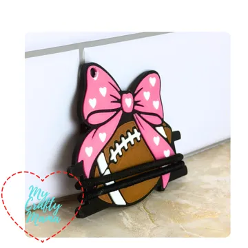 Accesorio para sujetar ligas de cabello: Football bow hair tie keychain — vista de referencia 3
