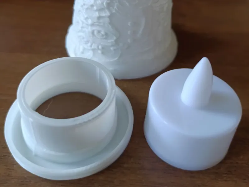 The basis of a New Year's bell for a tea candle