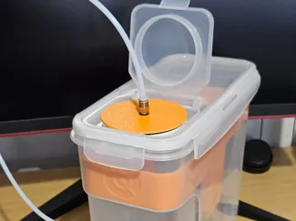 Dry box filament feed cap