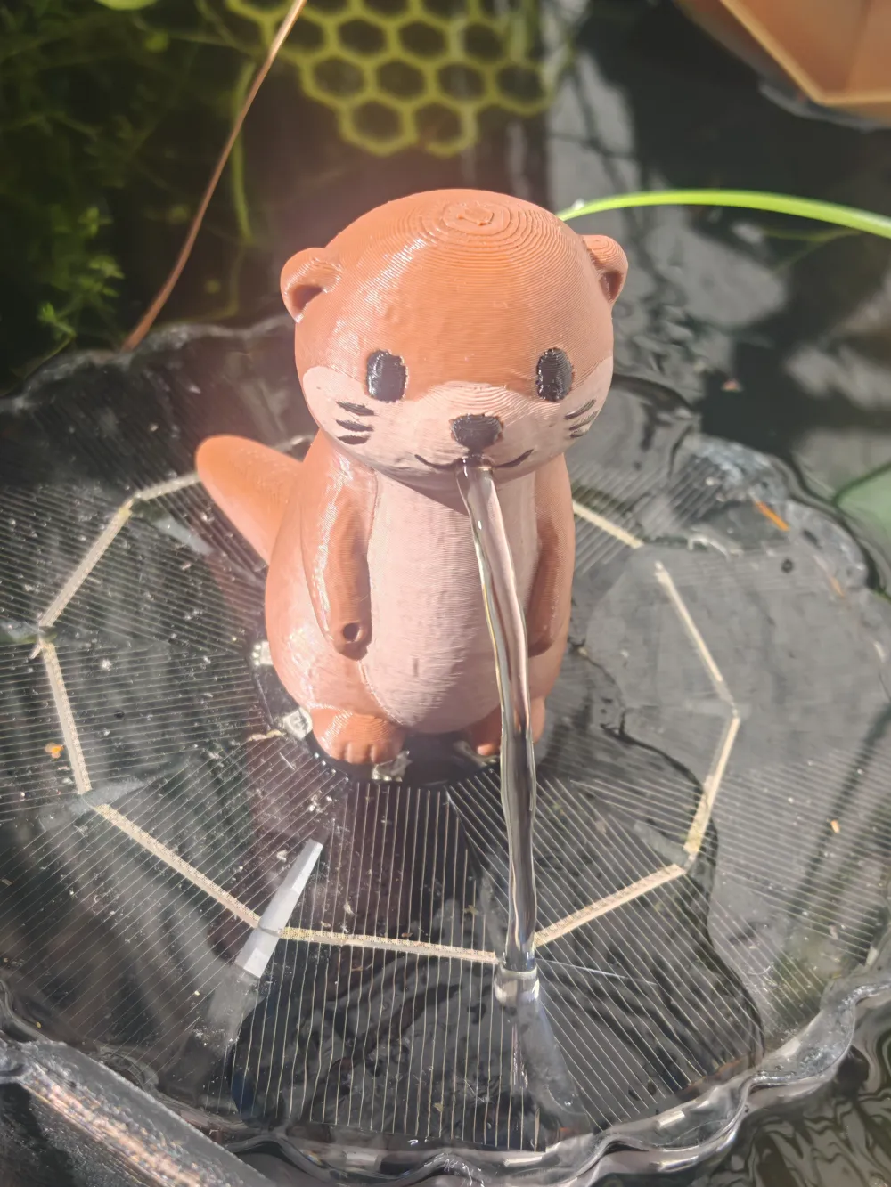 Printable Rod Rests Cute Otter Water Spitter Fountain - Free 3D Print Model - MakerWorld