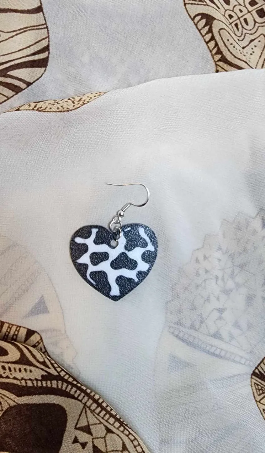 Cow print heart earrings view 2