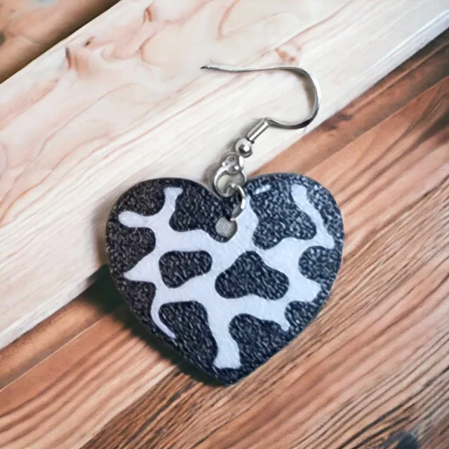 Cow print heart earrings