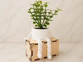 IKEA plant pot with arms and legs