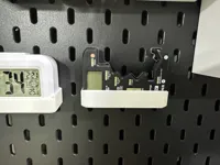 Support Skadis ultra-compact pour testeur de pile — photo 1