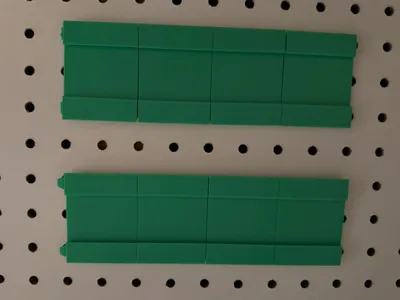 Multiboard rail for pegboard