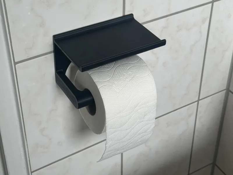 Toilet paper holder with phone place