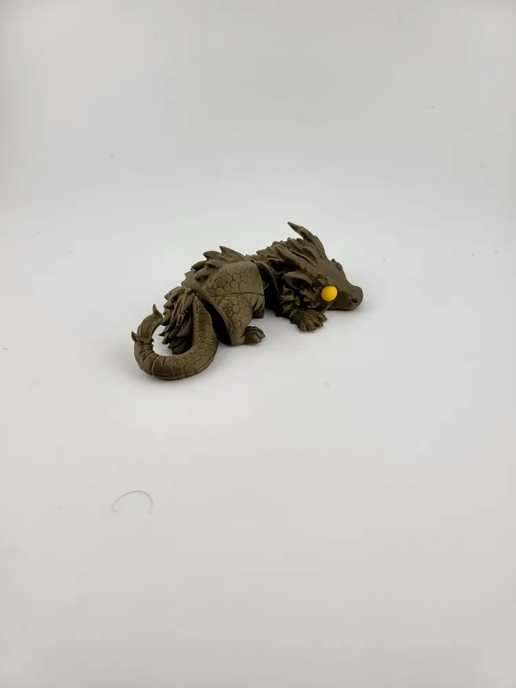 Flexi Articulated Dragon Fidget Toy v3 - Free 3D Print Model - MakerWorld