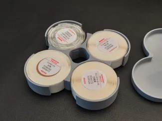 Niimbot label case with finger holes