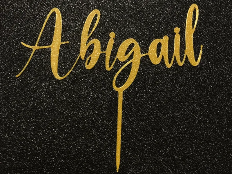 Cake topper name "Abigail"