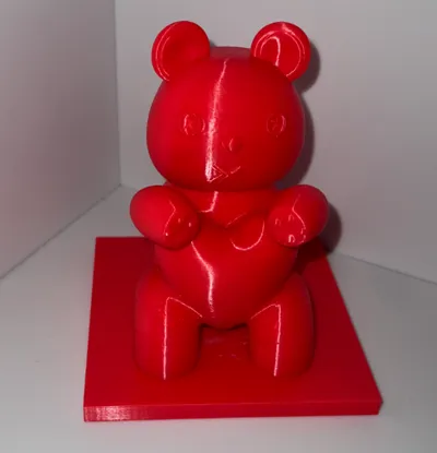 Plush Teddy bear holding a heart