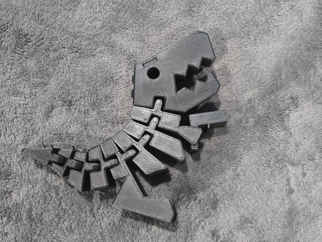 T-Rex articulé 200% avec accessoire pistolet