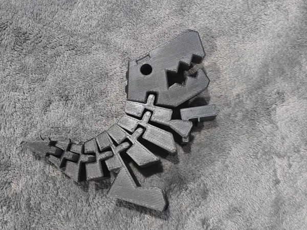 T-Rex articulé 200% avec accessoire pistolet
