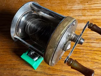 Wall Mount Bait Cast Reel Holder. V2