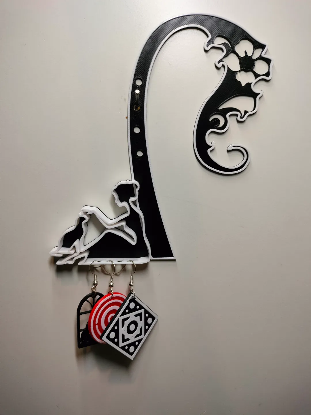 A hanger with a woman and a cat for earrings view 3