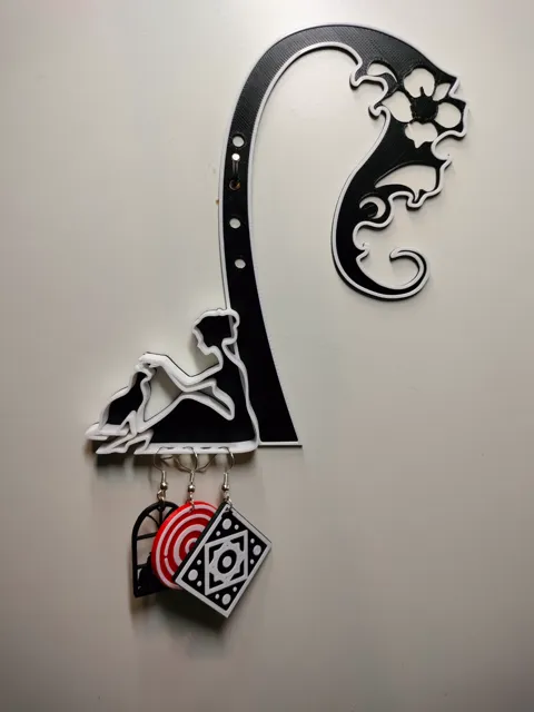 A hanger with a woman and a cat for earrings view 3