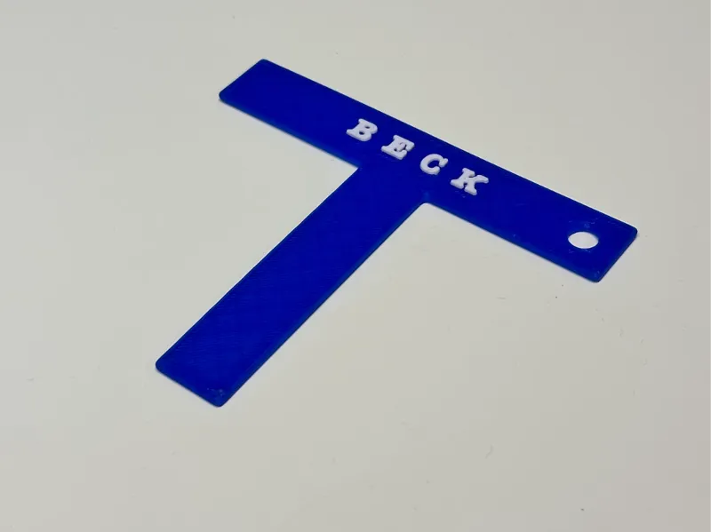 T-mark with name