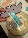 Liquid snack squeezer w hole for hanging