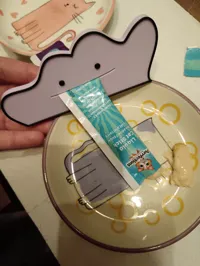 Liquid snack squeezer w hole for hanging