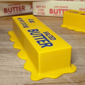 Objeto manipulable: Melted and Plain Butter Clicker Fidget (2 sizes) — vista de referencia 4