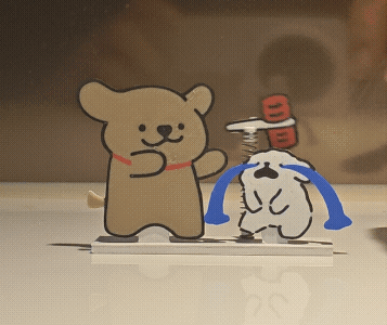 敲你狗头！线条小狗弹簧摇摇乐摆件
