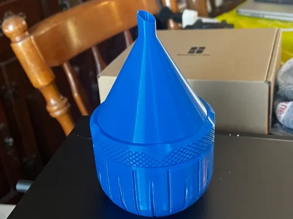 Couvercle entonnoir pour bocal de rangement