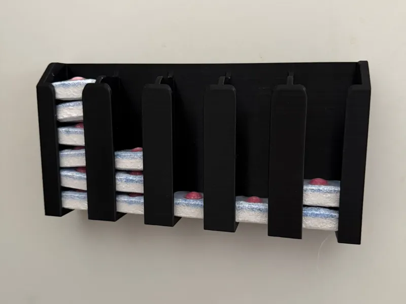 Dishwasher tablet holder