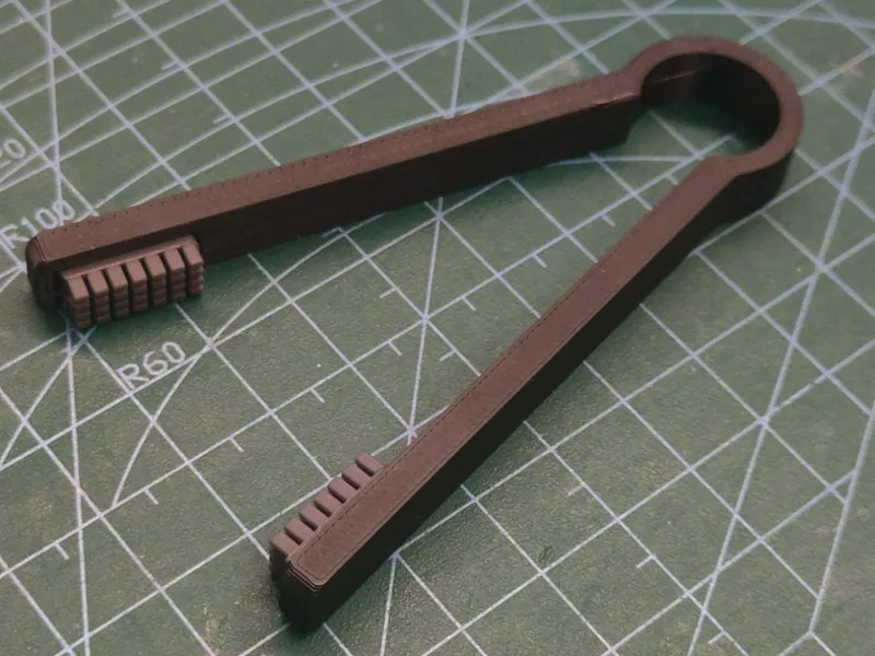Nozzle cleaning tool (tweezers-like design)