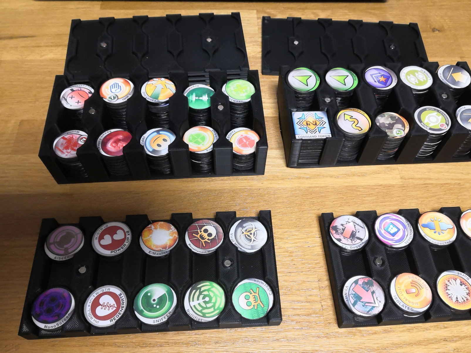 Magnetic token holders for Infinity the Game