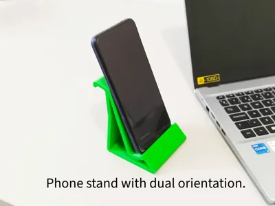 Mobile phone stand for vertical and horizontal use.