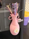 Vase with daisy flower